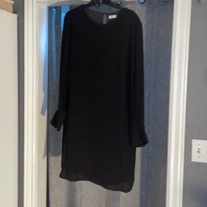 Brunello Cucinelli long sleeve, black, mid length dress. Never before worn.